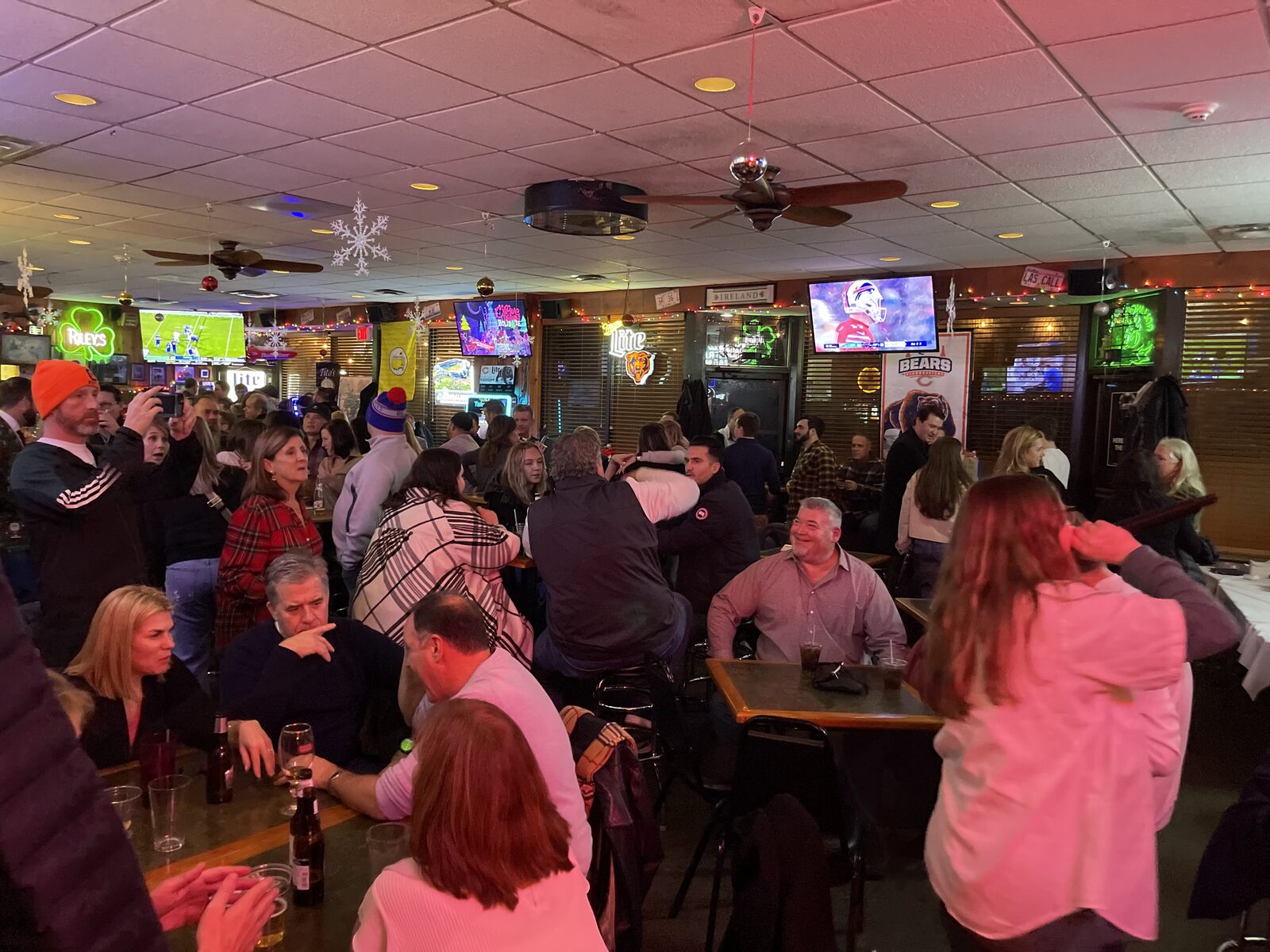 Guests singing karaoke at Riley's