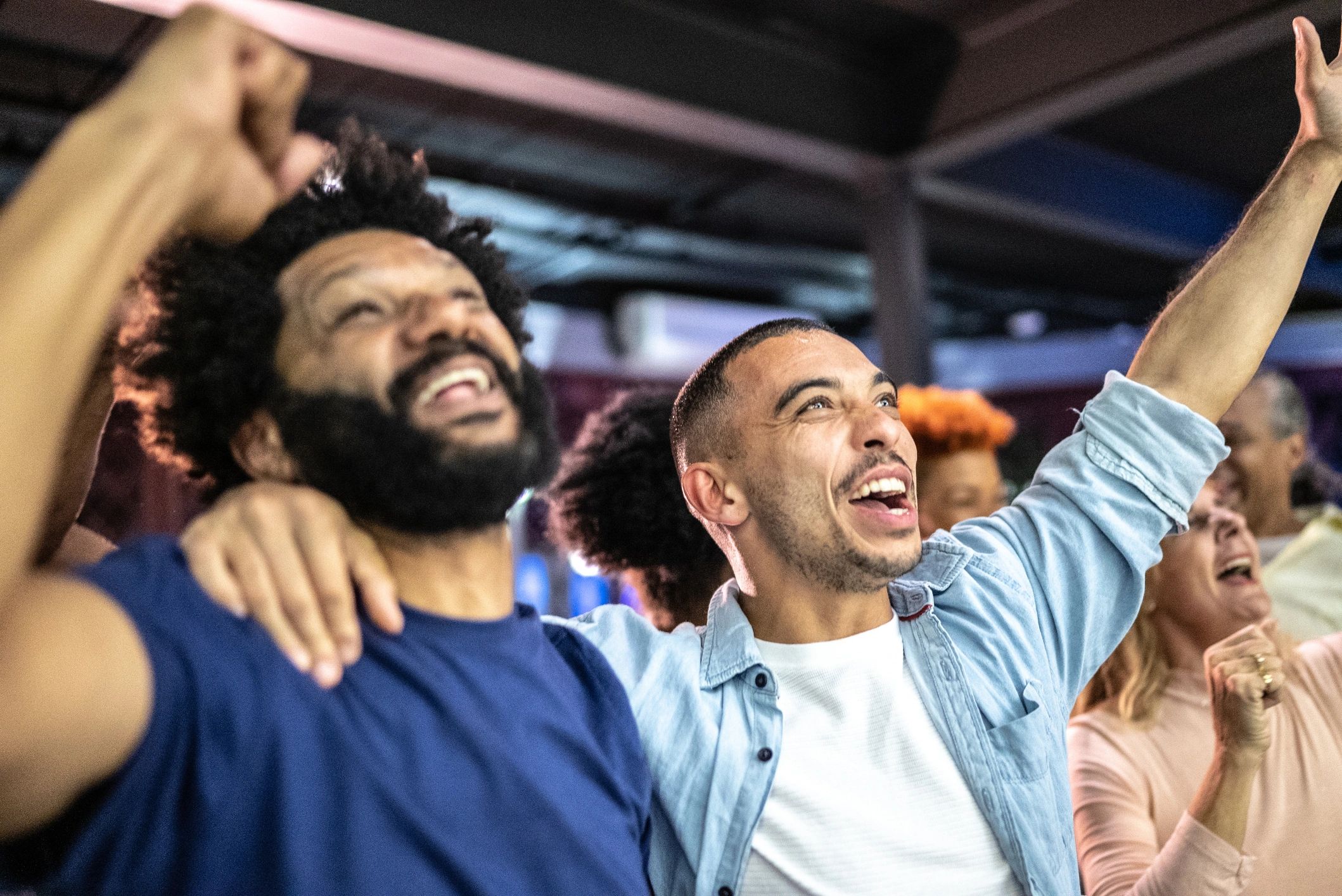 Guests enjoying a game at a bar